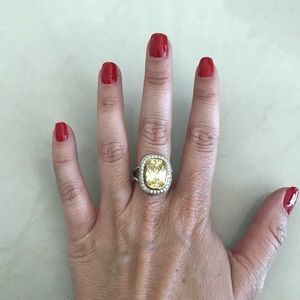 Silver and yellow stone costume jewelry ring